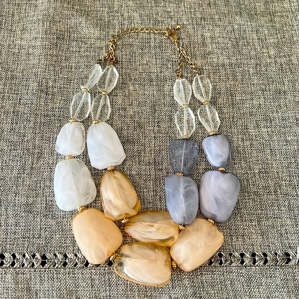 White, tan and blue beaded necklace